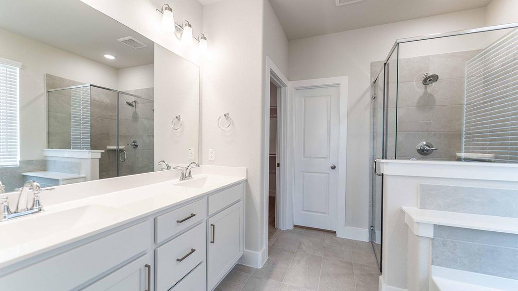 Furnished interior view inside a new home in Sunterra, Katy (Image 6).