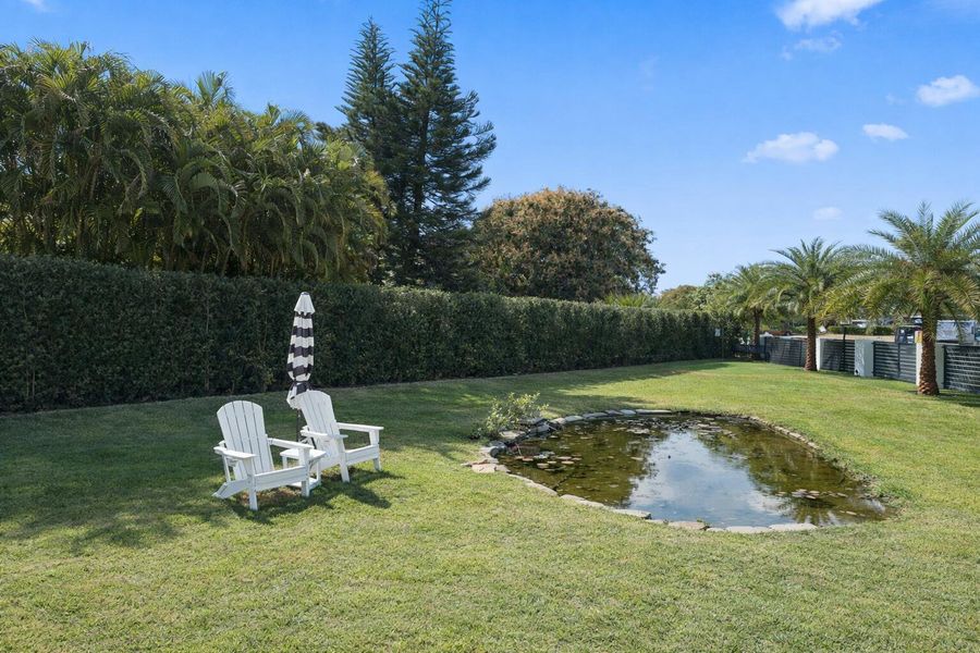 Expansive side yard & pond