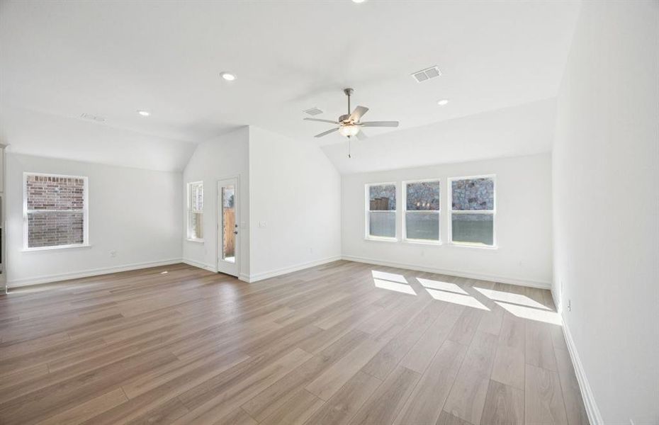 Bright and open gathering space with an adjoining nook Bright and open gathering space with an adjoining nook