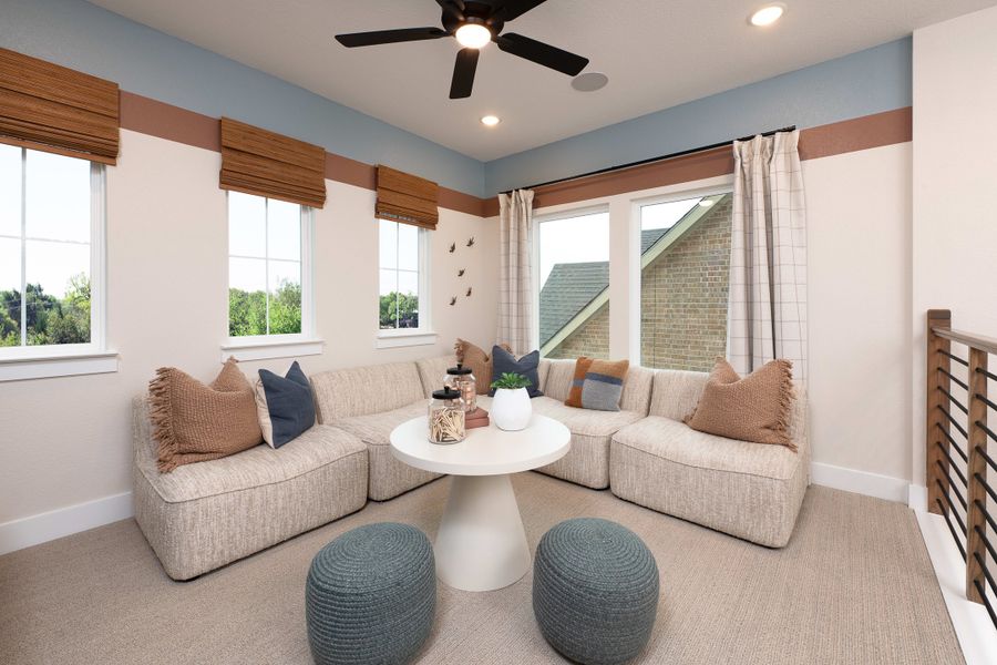 Representative furnished interior of a home built from the Magnolia by Tri Pointe Homes in Landmark, Denton (Image 12).