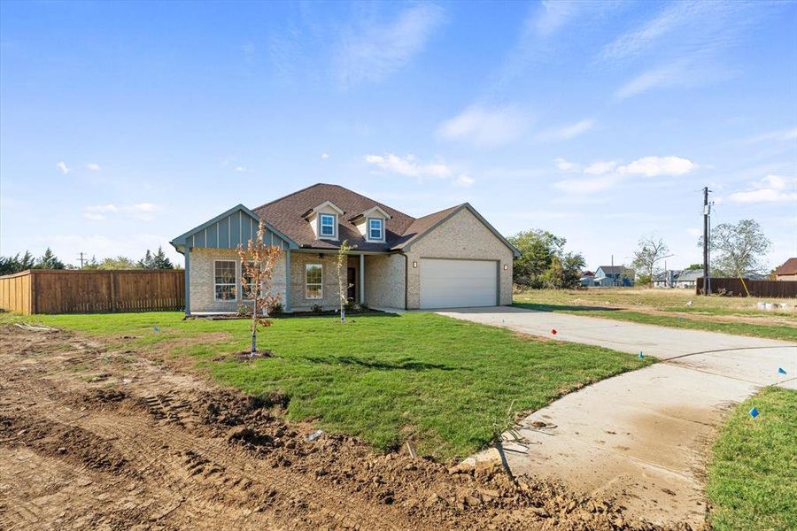 Front exterior of a new home in , East Tawakoni, TX, highlighting curb appeal (Image 16).