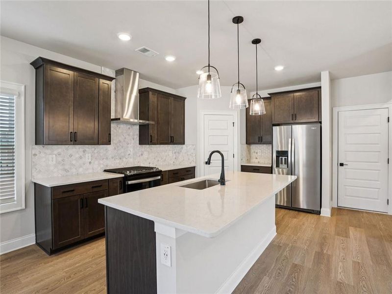 Furnished interior view inside a new home in Hemingway - Cottage Series, Cumming (Image 7).