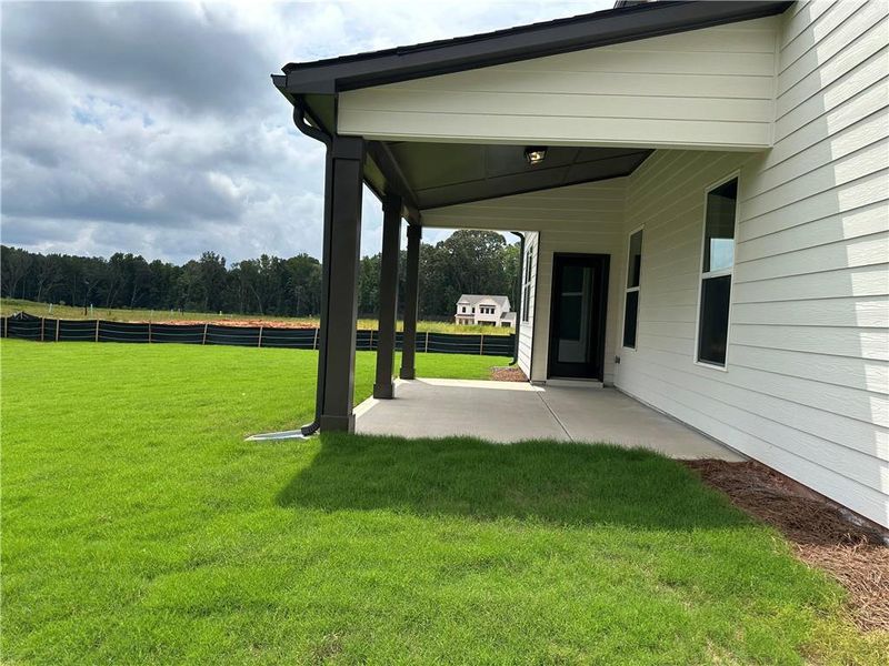 Front exterior of a new home in Rosewood Lake Estates, Hoschton, GA, highlighting curb appeal (Image 59).