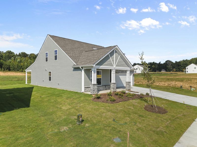 Front exterior of a new home in Hopewell Garden, Winston-Salem, NC, highlighting curb appeal (Image 2). Front exterior of a new home in Hopewell Garden, Winston-Salem, NC, highlighting curb appeal (Image 2).