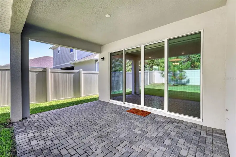 Exterior details and patio area of a home in , Mount Dora (Image 3).