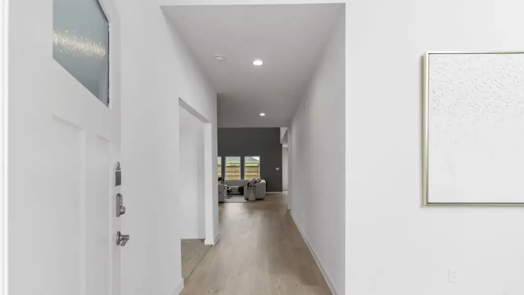 Representative unfurnished interior of a home built from the Lancaster - E50L by D.R. Horton in Harvest Pointe, Needville (Image 21).