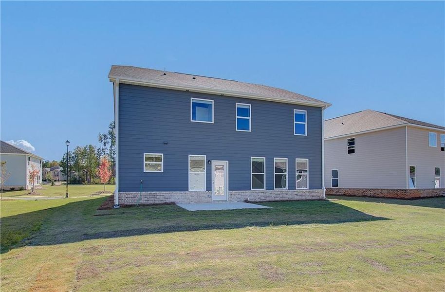 Front exterior of a new home in Westminster, Covington, GA, highlighting curb appeal (Image 17). Front exterior of a new home in Westminster, Covington, GA, highlighting curb appeal (Image 17).