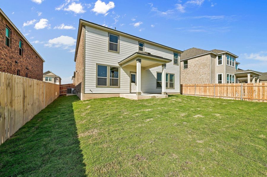 Exterior details and patio area of a home in Salerno - Classic Collection, Round Rock (Image 3). Exterior details and patio area of a home in Salerno - Classic Collection, Round Rock (Image 3).