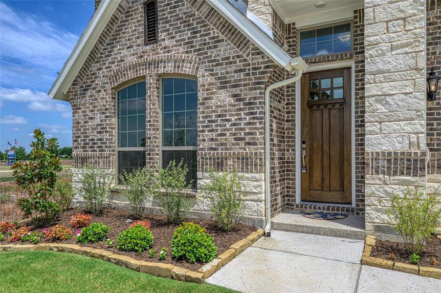 Exterior details and patio area of a home in Stone River Glen, Royse City (Image 24). Exterior details and patio area of a home in Stone River Glen, Royse City (Image 24).