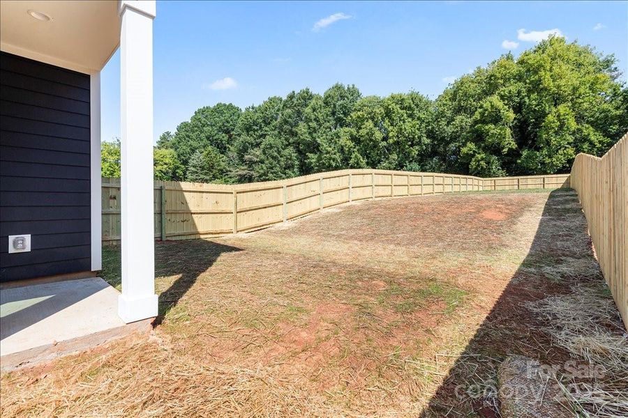 Exterior details and patio area of a home in , Charlotte (Image 2). Exterior details and patio area of a home in , Charlotte (Image 2).