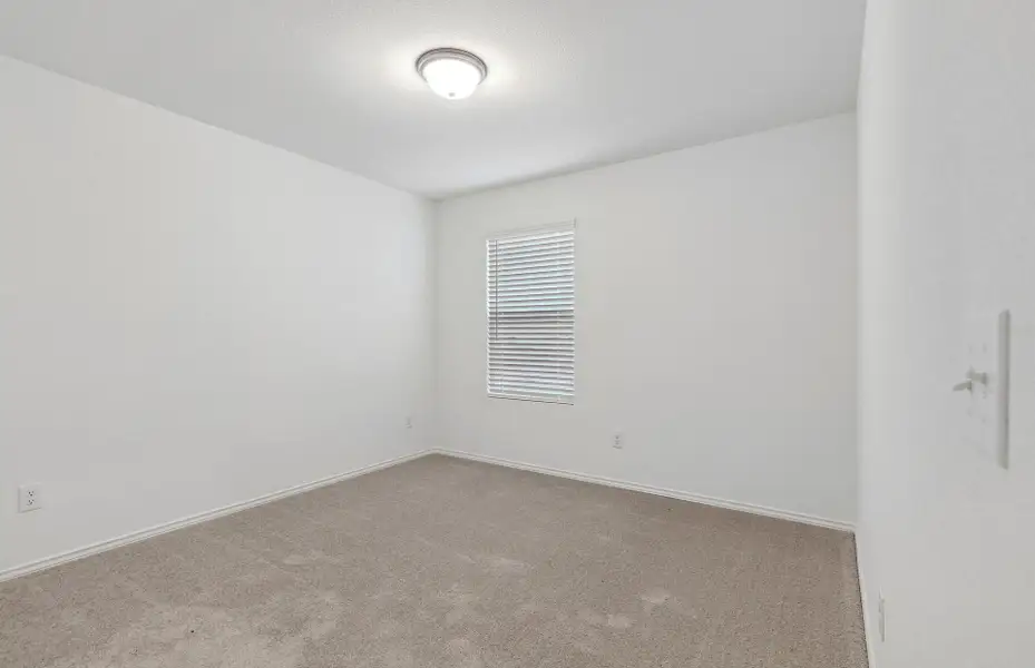 Representative unfurnished interior of a home built from the Killeen by Centex in Cottonwood, Howe (Image 13).