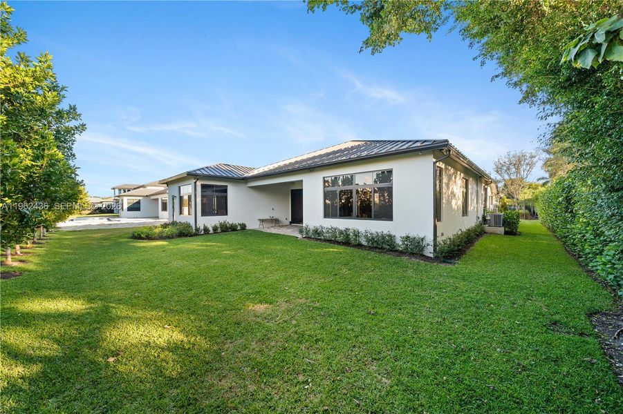 Exterior details and patio area of a home in , Miami (Image 24). Exterior details and patio area of a home in , Miami (Image 24).