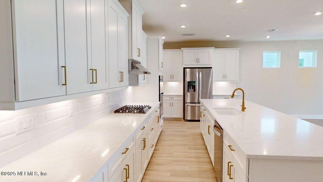 Furnished interior view inside a new home in RiverTown - WaterSong, St. Johns (Image 3).