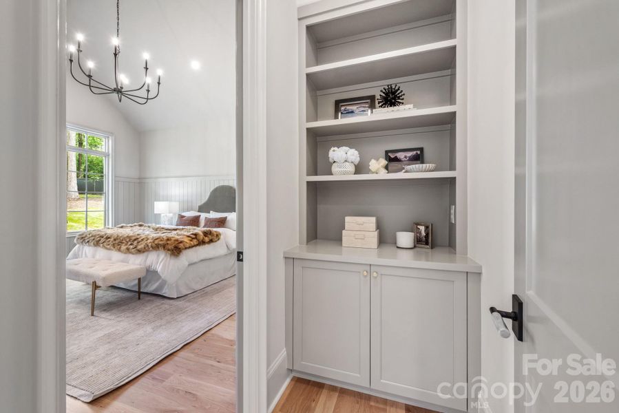 entry to the primary suite features built ins