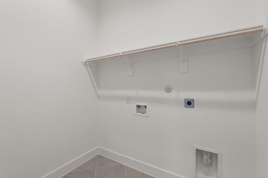 Representative unfurnished interior of a home built from the Palmer by Chesmar Homes in Riceland Alley Loads, Mont Belvieu (Image 42).