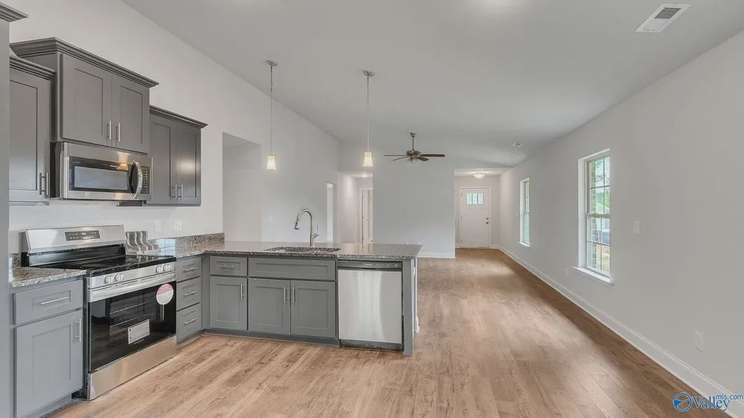 Representative furnished interior of a home built from the Plan 1434 by Adams Homes in Waverly Place, Richlands (Image 5).