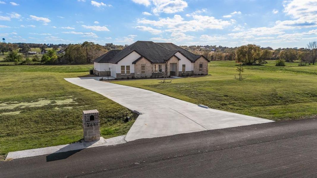 Front exterior of a new home in , Athens, TX, highlighting curb appeal (Image 1). Front exterior of a new home in , Athens, TX, highlighting curb appeal (Image 1).