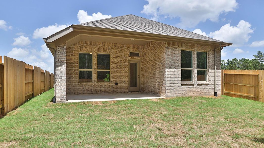 Exterior details and patio area of a home in Wildtree, Magnolia (Image 3).