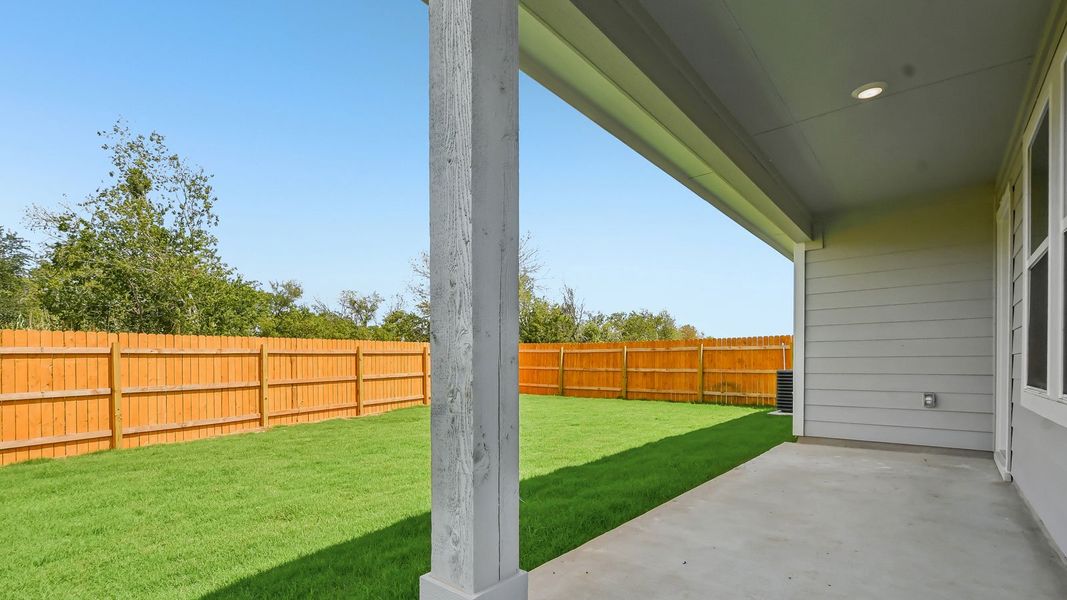 Exterior details and patio area of a home in Trails at Wildhorse, Austin (Image 4).