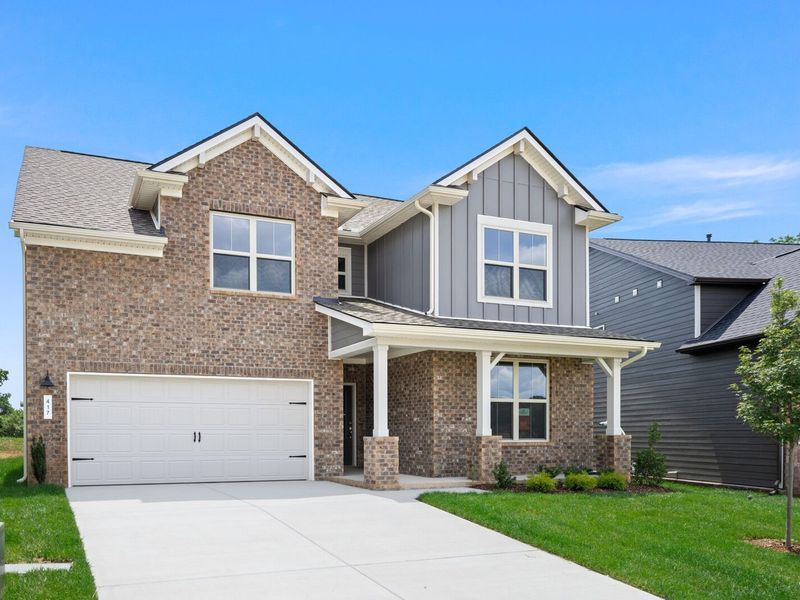 Front exterior of a new home in Woods Crossing, Gallatin, TN, highlighting curb appeal (Image 2).