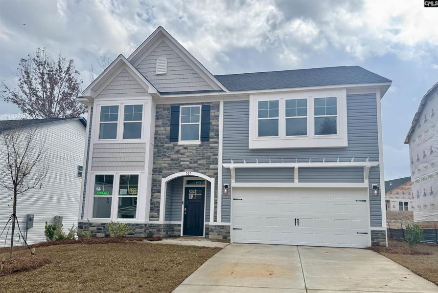 Front exterior of a new home in Boykin Hills, Chapin, SC, highlighting curb appeal (Image 1). Front exterior of a new home in Boykin Hills, Chapin, SC, highlighting curb appeal (Image 1).