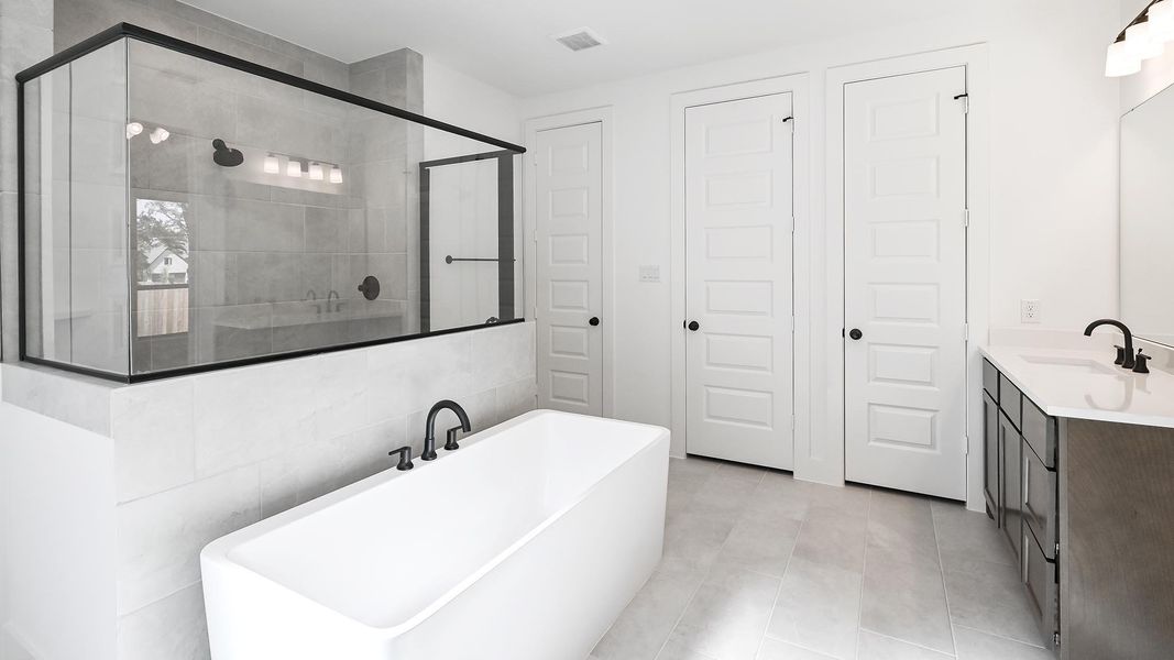 Furnished interior view inside a new home in 6 Creeks, Kyle (Image 9).