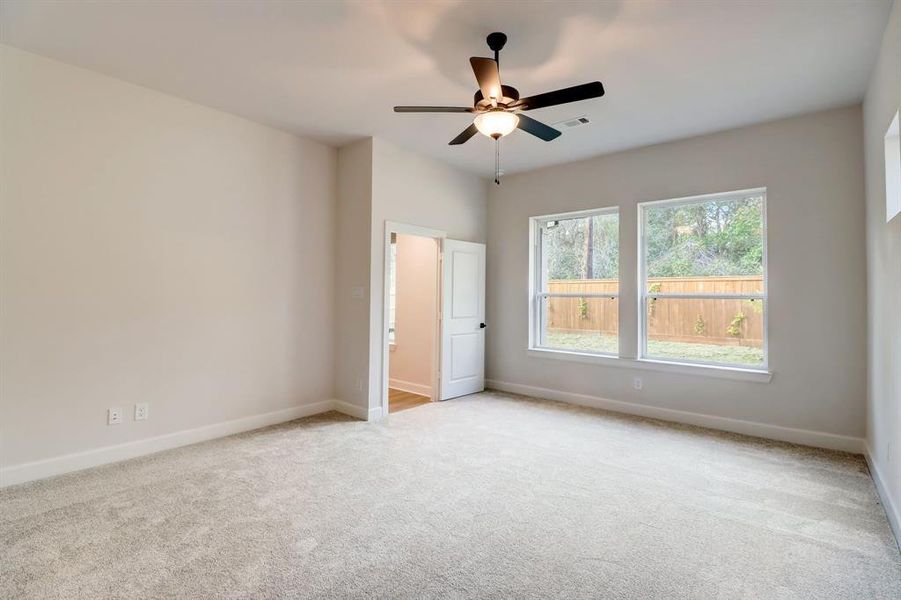 EXAMPLE PHOTO: Extended master bedroom with view to rear yard