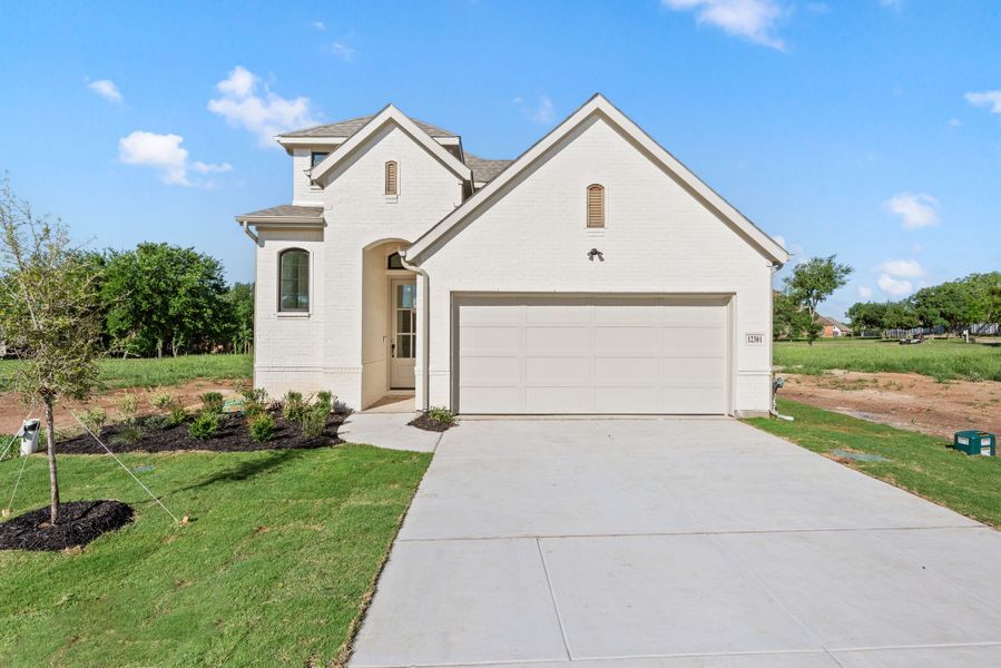 Representative exterior photo of a completed home built from the Emerald by Our Country Homes in The Resort on Eagle Mt. Lake, Saginaw, TX (Image 4).