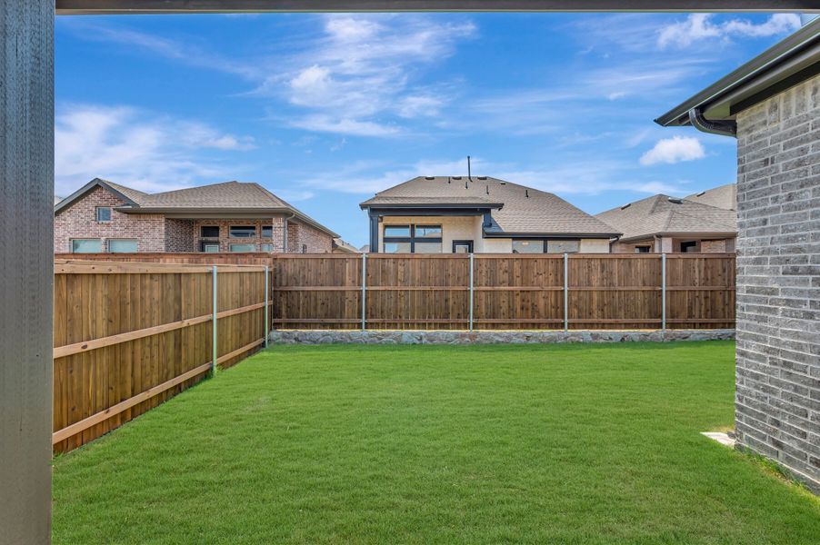 Exterior details and patio area of a home in Creekshaw – Gardens, Royse City (Image 3). Exterior details and patio area of a home in Creekshaw – Gardens, Royse City (Image 3).