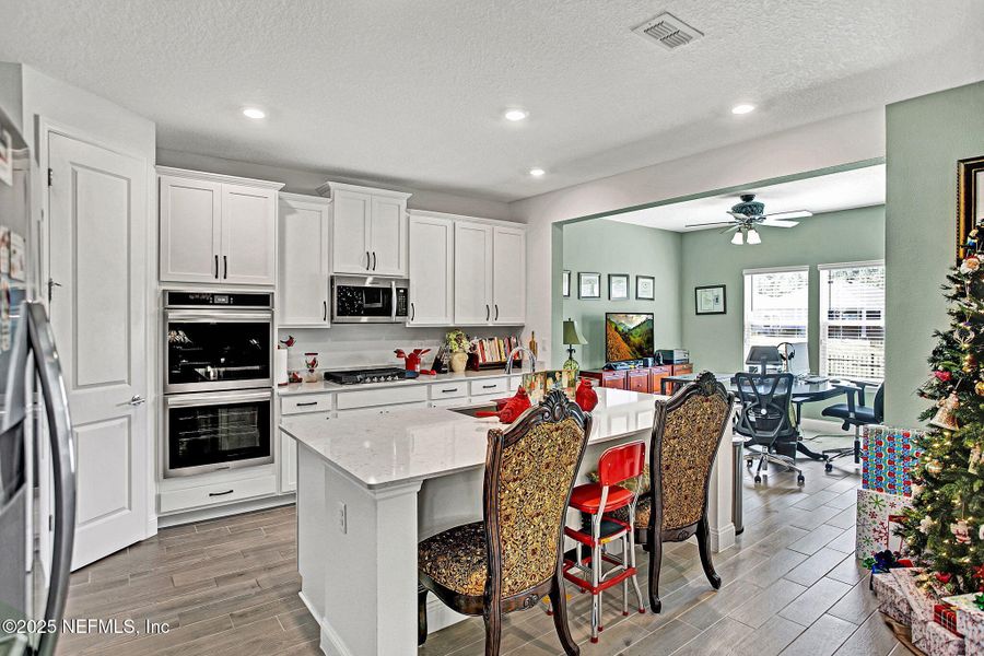 Furnished interior view inside a new home in Tributary: Lakeview at Tributary 60's, Yulee (Image 5).
