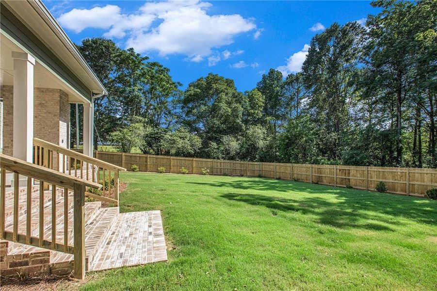 Front exterior of a new home in , Canton, GA, highlighting curb appeal (Image 31). Front exterior of a new home in , Canton, GA, highlighting curb appeal (Image 31).