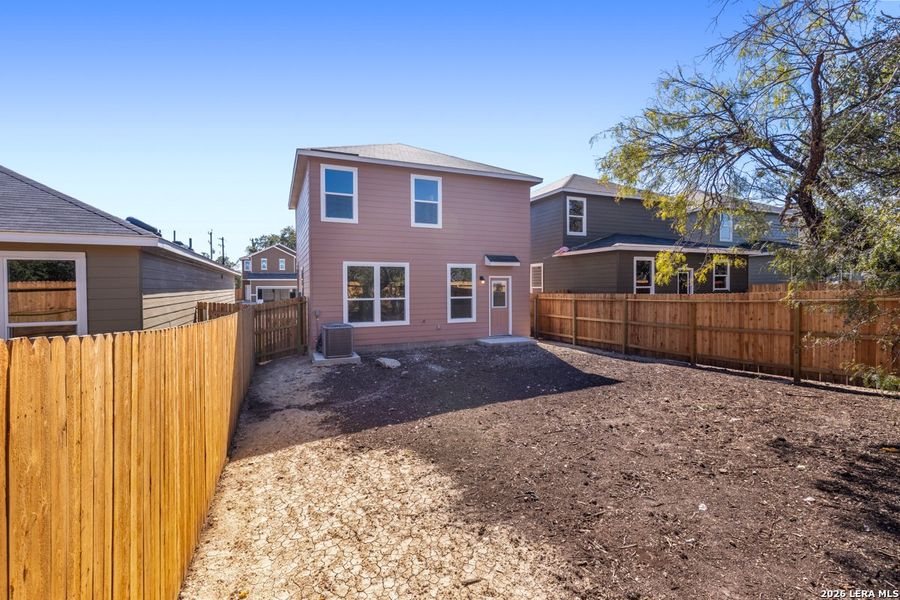 Exterior details and patio area of a home in Spanish Trails Villas, San Antonio (Image 4).