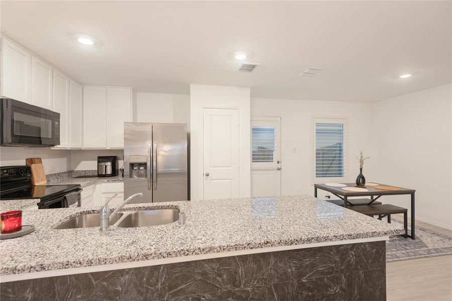 Furnished interior view inside a new home in Tillage Farms, Princeton (Image 18).
