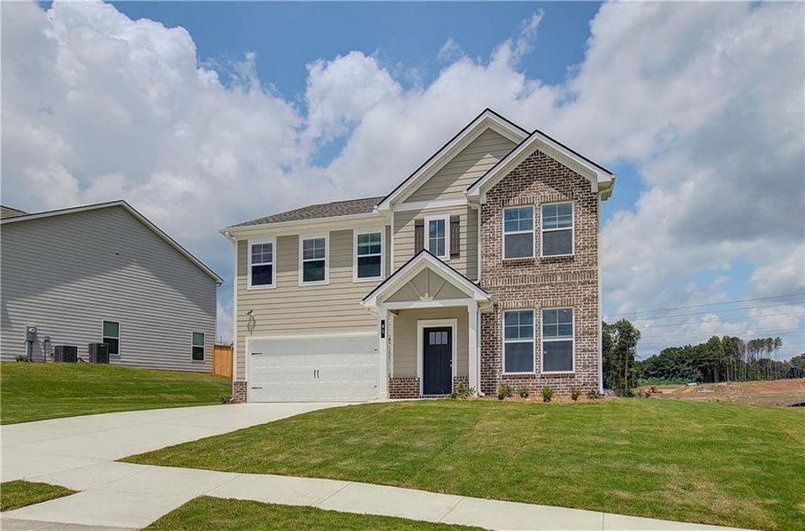 Front exterior of a new home in Chapel Hill, Newnan, GA, highlighting curb appeal (Image 15). Front exterior of a new home in Chapel Hill, Newnan, GA, highlighting curb appeal (Image 15).