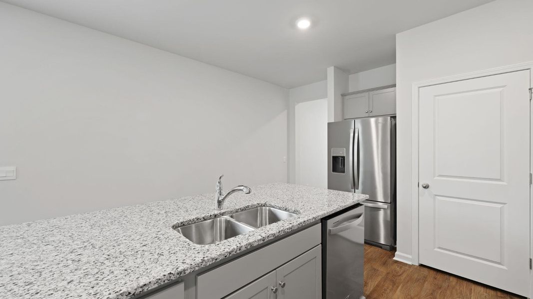 Furnished interior view inside a new home in Pine Hills at Cane Bay, Summerville (Image 4). Furnished interior view inside a new home in Pine Hills at Cane Bay, Summerville (Image 4).