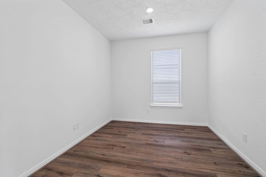 Spacious, unfurnished interior of a new home in Mustang Ridge, Magnolia (Image 17).