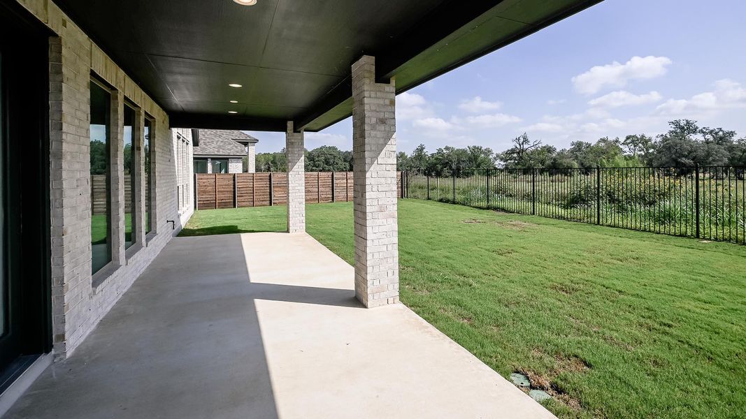Exterior details and patio area of a home in Juniper Springs, Lockhart (Image 4).