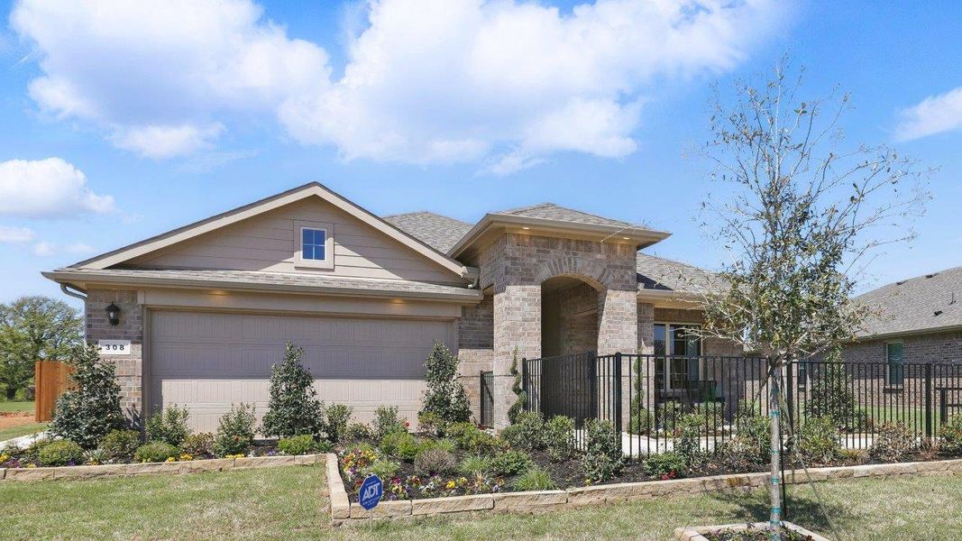 Front exterior of a new home in Sandy Beach, Azle, TX, highlighting curb appeal (Image 1). Front exterior of a new home in Sandy Beach, Azle, TX, highlighting curb appeal (Image 1).