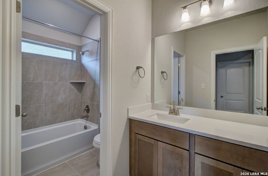 Furnished interior view inside a new home in Stream Waters, Seguin (Image 4).