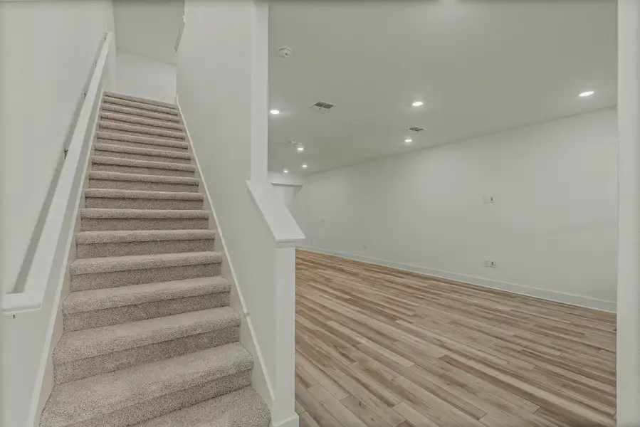 Spacious, unfurnished interior of a new home in Harvest at Ovation - Townhomes, Winter Garden (Image 19).
