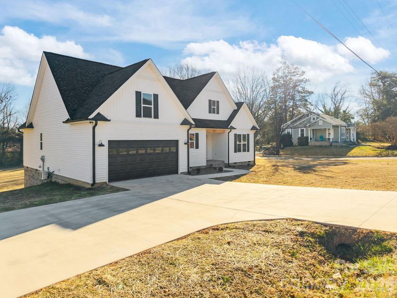 Front exterior of a new home in , Salisbury, NC, highlighting curb appeal (Image 14).