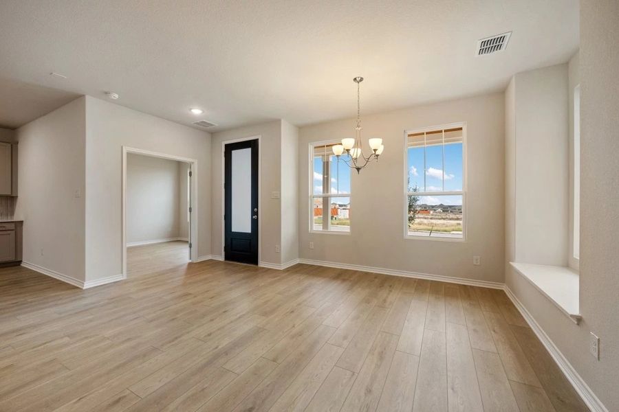 Spacious, unfurnished interior of a new home in The Cottages at Lariat, Liberty Hill (Image 25).