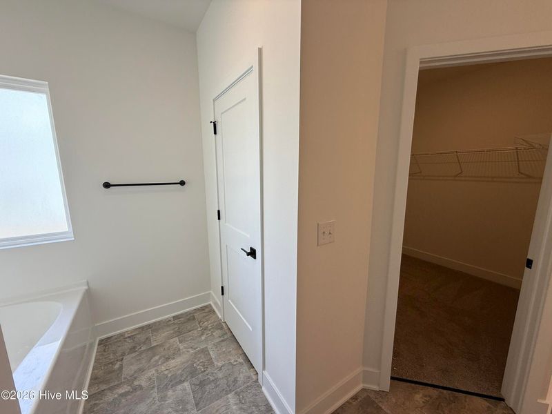 Spacious, unfurnished interior of a new home in Wood Creek Landing, Leland (Image 38).