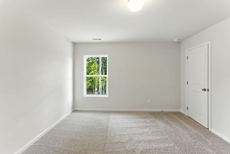 Representative unfurnished interior of a home built from the Brentwood by Piedmont Residential in Falls Creek, Flowery Branch (Image 27).