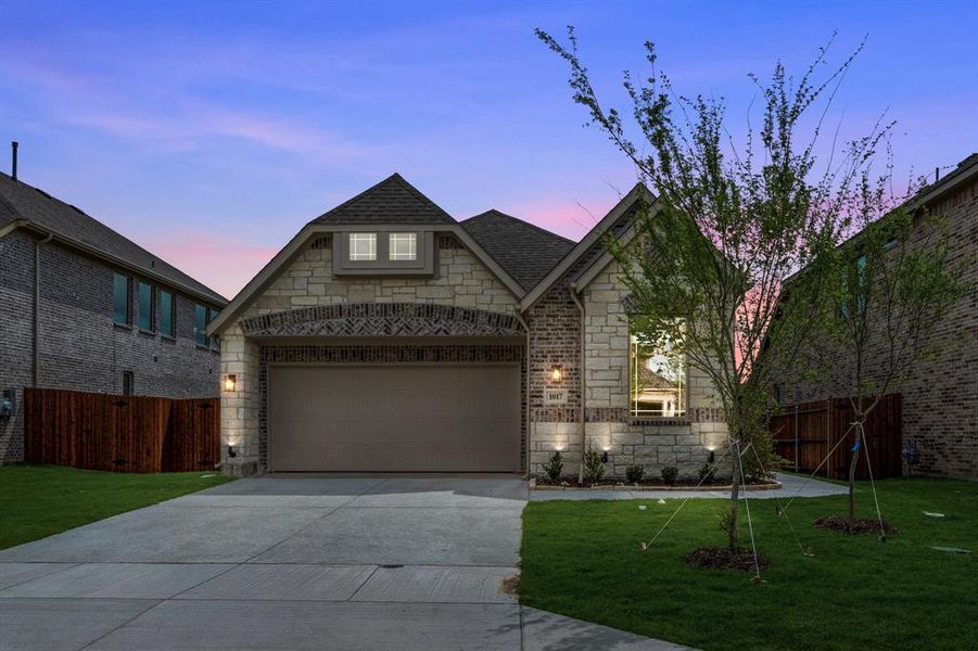 Front exterior of a new home in Star Ranch, Godley, TX, highlighting curb appeal (Image 2).