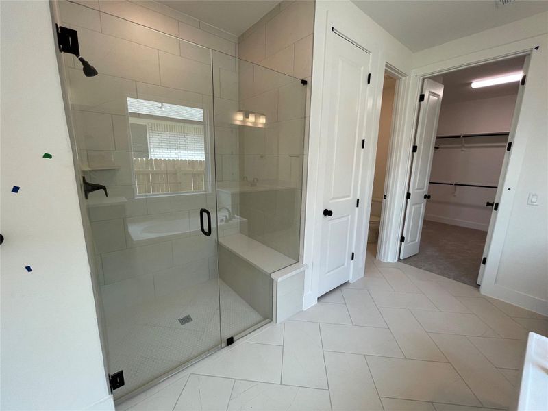 Primary Bath retreat with garden tub & walk-in shower Primary Bath retreat with garden tub & walk-in shower