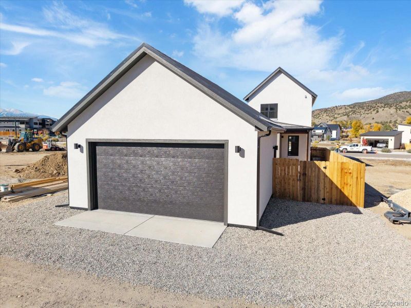 Front exterior of a new home in , Salida, CO, highlighting curb appeal (Image 1).