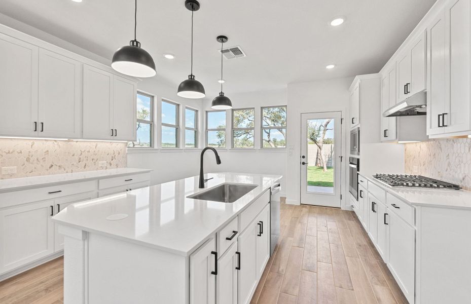 Furnished interior view inside a new home in Wolf Ranch, Georgetown (Image 11).