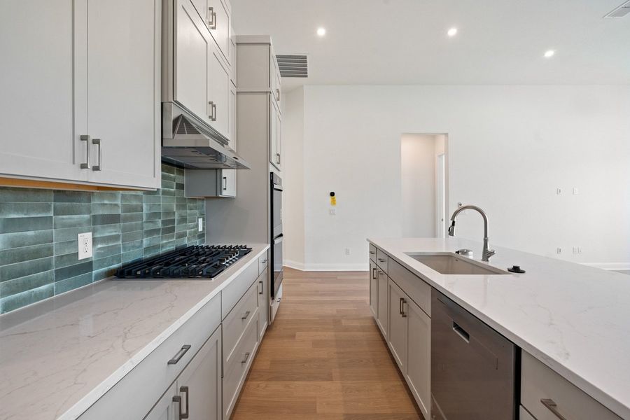 Furnished interior view inside a new home in Persimmon, Buda (Image 6).
