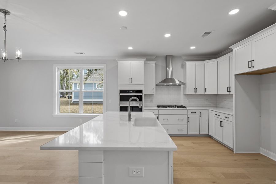 Furnished interior view inside a new home in K. Hovnanian's® Four Seasons at Lakes of Cane Bay, Summerville (Image 5).